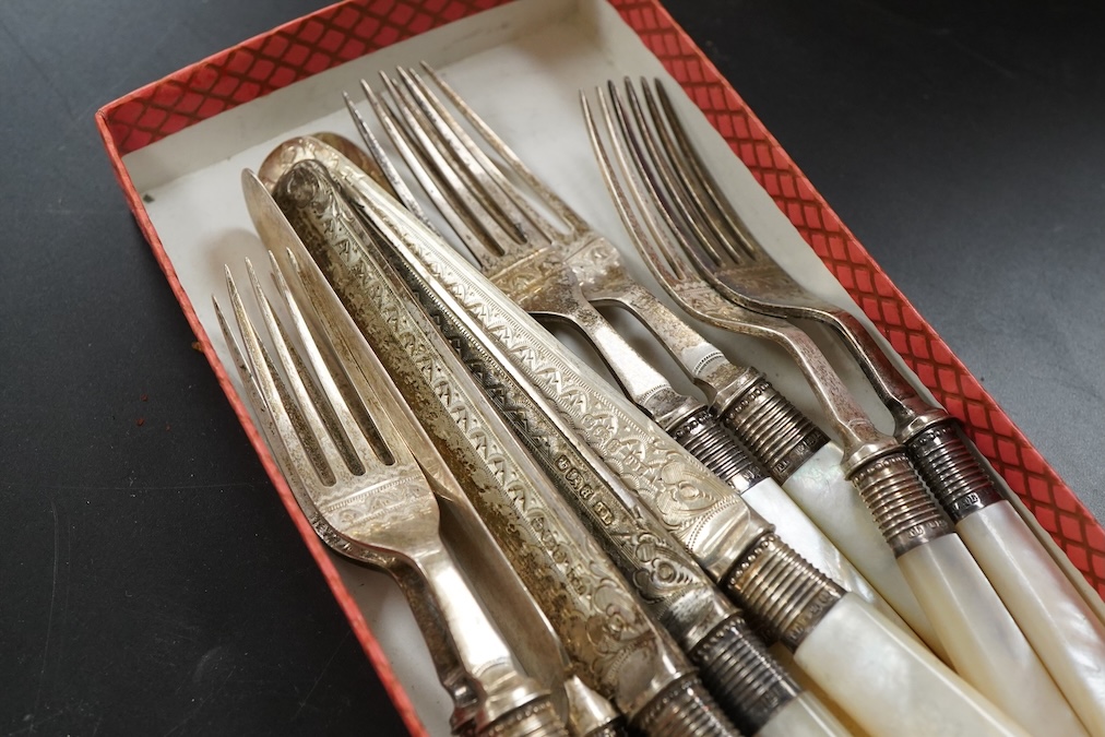 A set of six late Victorian mother pearl handled silver fruit knives and forks length 19.4 cm.